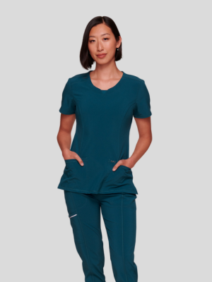 infinity scrubs woman in Caribbean blue matching scrubs set